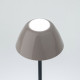 Lampada da tavolo con struttura in metallo nera e diffusore in PVC