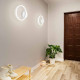 Applique da parete rotonda a LED con struttura in metallo dal design moderno