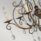 Lampadario grande in stile rustico in acciaio e dettagli in cristallo con 6 luci