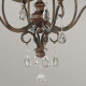 Lampadario medio in stile rustico in acciaio e dettagli in cristallo con 4 luci