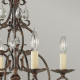 Lampadario medio in stile rustico in acciaio e dettagli in cristallo con 4 luci