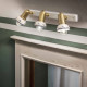 Applique da parete rustica con tre paralumi in ceramica decorata a mano