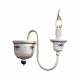 Applique da parete rustica in metallo con dettagli in ceramica decorati a mano