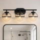 Lampada a parete in acciaio 3 diffusori in vetro trasparente design moderno