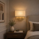 Lampada da parete in acciaio con paralume in tessuto dal design moderno