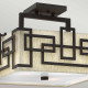Lampada da soffitto in acciaio con paralume in tessuto dal design moderno