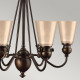 Lampadario con struttura rustica in acciaio e 6 diffusori in vetro ambrato