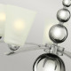 Lampadario gigante in acciaio con diffusore in vetro a 8 luci dal design moderno