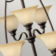 Lampadario grande in acciaio con 15 diffusori in vetro dal design classico
