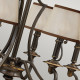 Lampadario rustico con struttura in acciaio e diffusori in organza a 6 luci