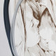 Capezzale in legno dal design moderno con raffigurazione incisa a laser