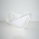 Centrotavola moderno in plexiglass traforato dalle linee eleganti