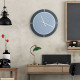 Orologio da parete rotondo con struttura in legno dal design minimalista moderno