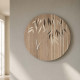 Orologio da parete rotondo dal incisioni laser su legno dal design elegante