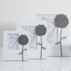 Portafoto da tavolo in legno con applicazione floreale dal design elegante