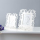 Portafoto da tavolo in plexiglass traforato con dettagli incisi a laser