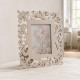 Portafoto da tavolo piccolo in legno dal design moderno ed elegante