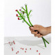 Fiore in vetro con bacche rosse
