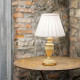 Lampada da tavolo con struttura in resina e diffusore in tessuto