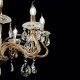 Lampadario grande con bracci in vetro soffiato dettagli in metallo placato