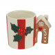 Tazza in ceramica con pungitopo natalizio