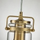 Lampada a sospensione in acciaio con un diffusore in vetro dal design industrial