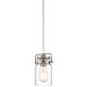 Lampada a sospensione in acciaio con un diffusore in vetro dal design industrial