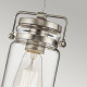 Lampada a sospensione in acciaio con un diffusore in vetro dal design industrial