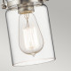 Lampada a sospensione in acciaio con un diffusore in vetro dal design industrial