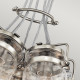 Lampada a sospensione in acciaio dal design industrial con 6 diffusori in vetro
