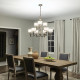 Lampadario grande in acciaio con 9 diffusori in tessuto dal design elegante