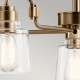 Lampadario in acciaio a 5 luci con diffusori in vetro dalle linee eleganti