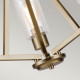 Lampadario in acciaio con triplo diffusore in vetro dal design minimal