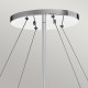 Lampadario ovale a 6 luci dalle linee moderne in acciaio e pendenti in cristallo