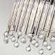 Lampadario ovale a 6 luci dalle linee moderne in acciaio e pendenti in cristallo