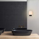 Applique con struttura in metallo con diffusore in vetro dal design moderno