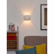 Applique da parete con struttura rotonda in cemento traforato dal design moderno