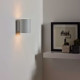Applique da parete in alluminio con struttura tubolare dal design moderno