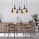 Lampada a sospensione lineare con diffusori pendenti in vetro dal design moderno