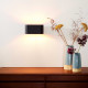 Lampada da parete con struttura ovale in alluminio dalle linee moderne