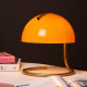 Lampada da tavolo di design con struttura in metallo e diffusore in vetro