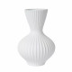 Lampada da tavolo in porcellana dalle linee sinuose e moderne