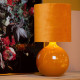 Lampada da tavolo in vetro dal design moderno con diffusore in tessuto