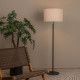 Lampada da terra con struttura in metallo e diffusore ovale in tessuto