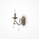 Applique classica in metallo con lampadina a fiamma e pendenti in cristallo