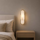 Applique da parete con diffusore ovale in marmo dal design elegante