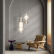 Lampada a sospensione a LED dal design elegante con 4 diffusori sfere in vetro