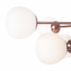 Lampadario elegante in metallo con diffusori in vetro a boccia