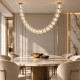 Lampadario moderno con struttura in metallo e diffusore a led