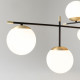 Lampadario moderno per soggiorno con paralumi a bocce di vetro